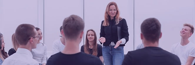 UG Images 318x106-12 woman in center speaking to adolescents