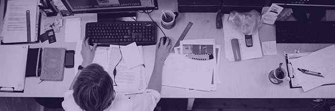 UG Images 318x106-24 man working in his office