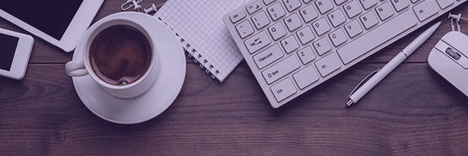 UG Images 318x106-8 coffee cup next to keyboard