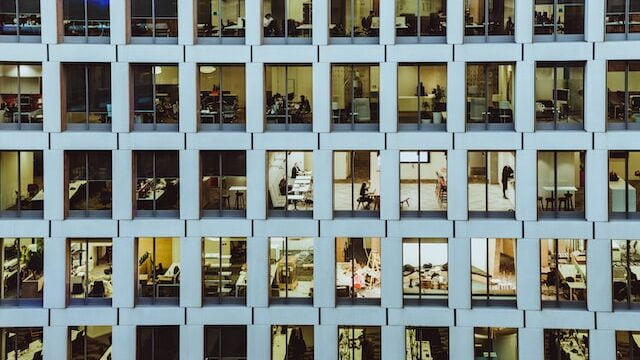 Office building with many offices and employees