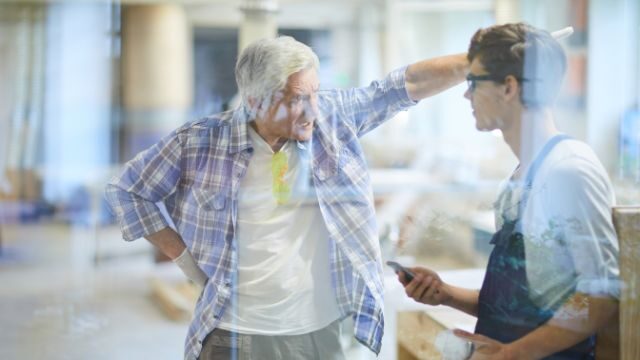 Manager yelling at an employee in the workplace