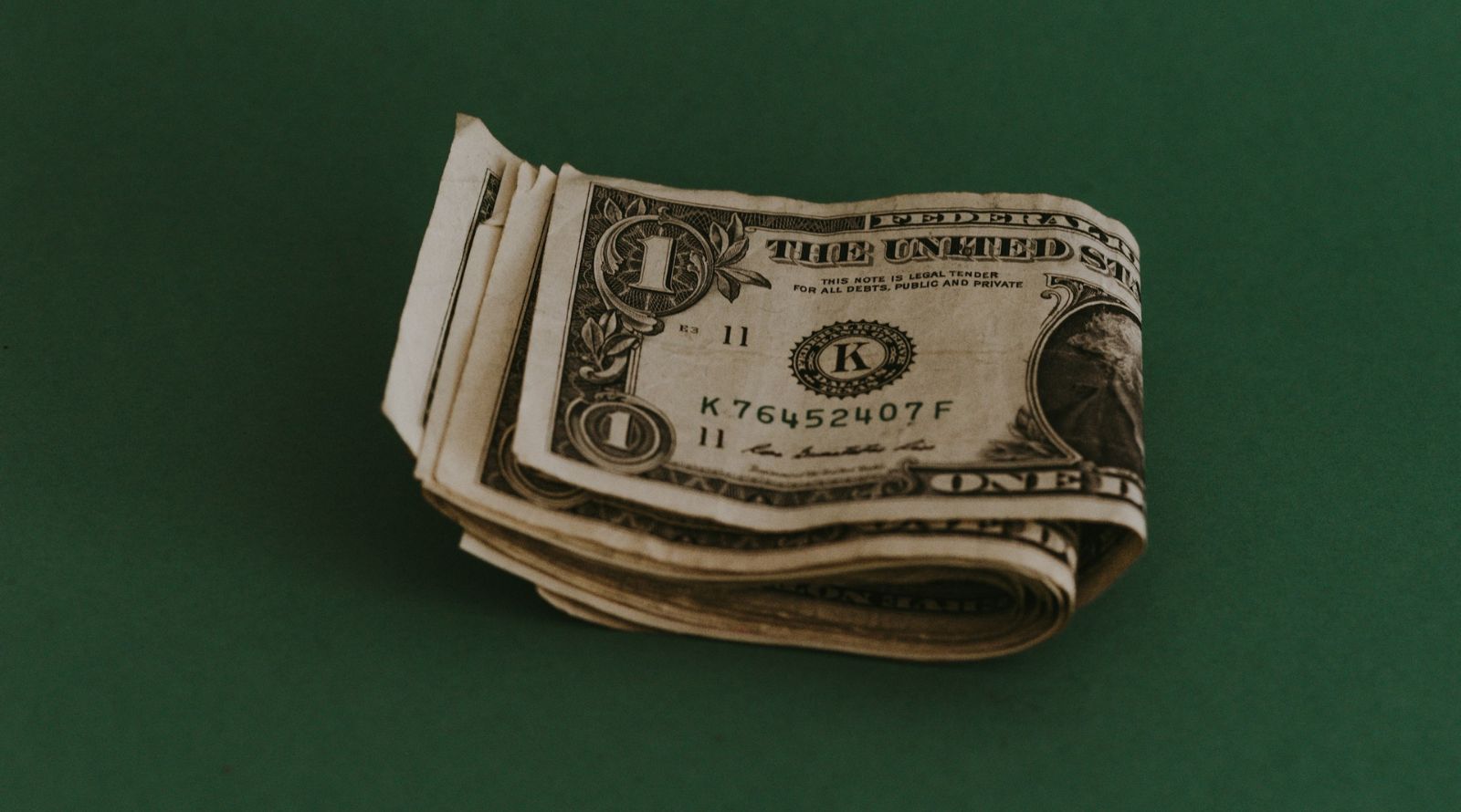 Image of money on a green background